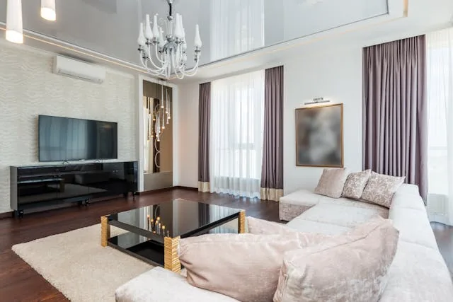 A living room with L couch